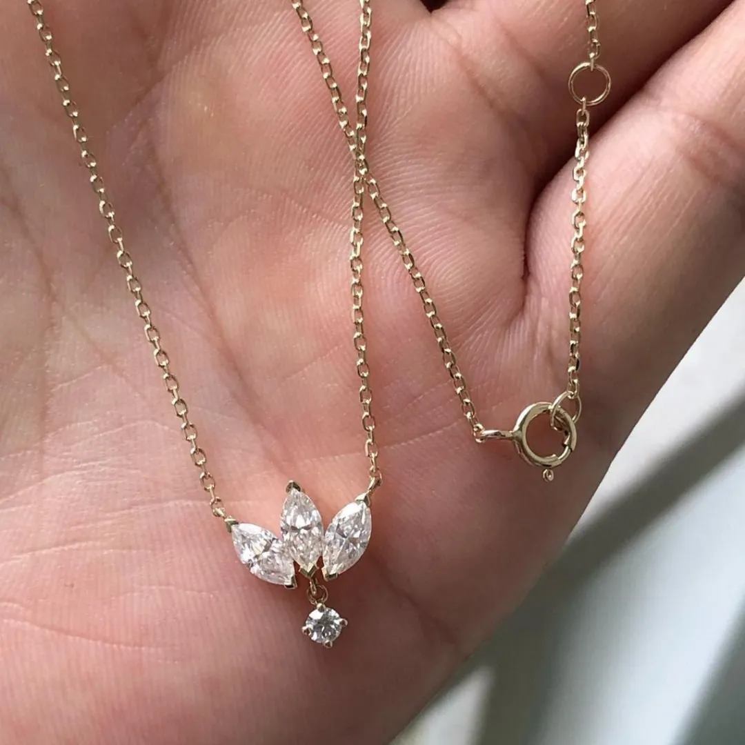 /public/photos/live/Marquise & Round Four Stone Moissanite Pendant 550 (1).webp